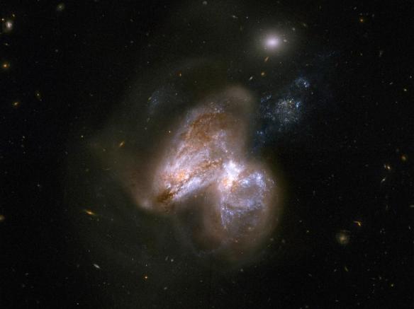 Are Two Giant Black Holes About to Collide?