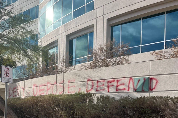 Deny depose defend was spray painted on the v0 qxa7ssd5rt6e1.jpeg.