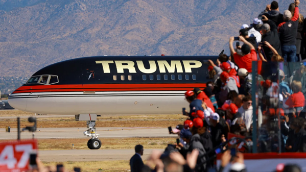 Supporters of republican presidential nominee and former u s president donald trump attend a donald trump campaign rally in alb.jpg.